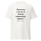 Unisex heather gray t-shirt featuring Malcolm Forbes Democracy quote typography printed across the front chest
