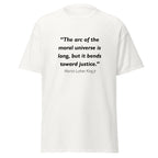 Unisex black t-shirt featuring MLK Arc of the Moral Universe quote typography printed across the front chest