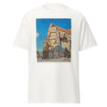 Unisex black t-shirt featuring Alfred Sisley painting "Eglise Moret" printed across the front