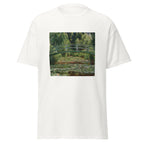 Unisex t-shirt featuring Claude Monet 'Poirier En Fleurs' artwork, shown in White, front view, sizes S–5XL