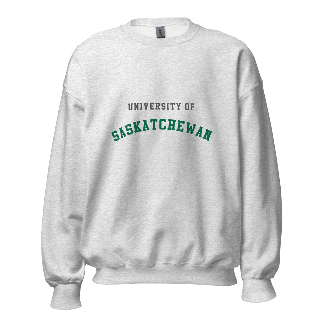 Unisex sweatshirt featuring University of Saskatchewan name and branding in green and gold