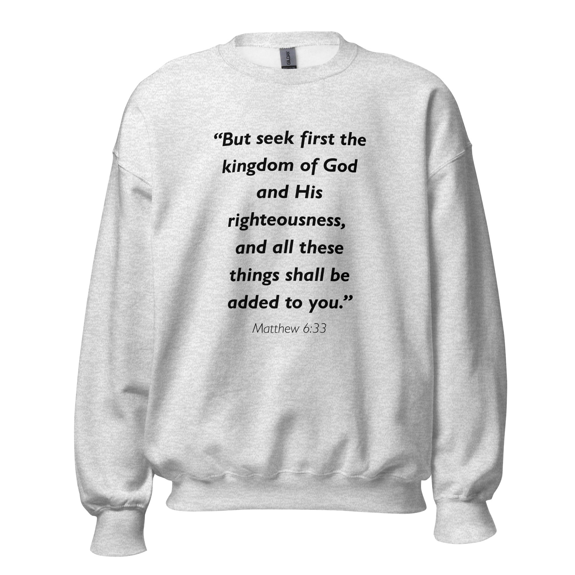 Unisex black sweatshirt with Matthew 6:33 Bible verse printed in black text on front