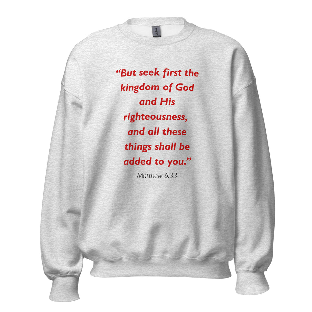 Unisex navy blue sweatshirt with Matthew 6:33 Bible verse printed in red text on front
