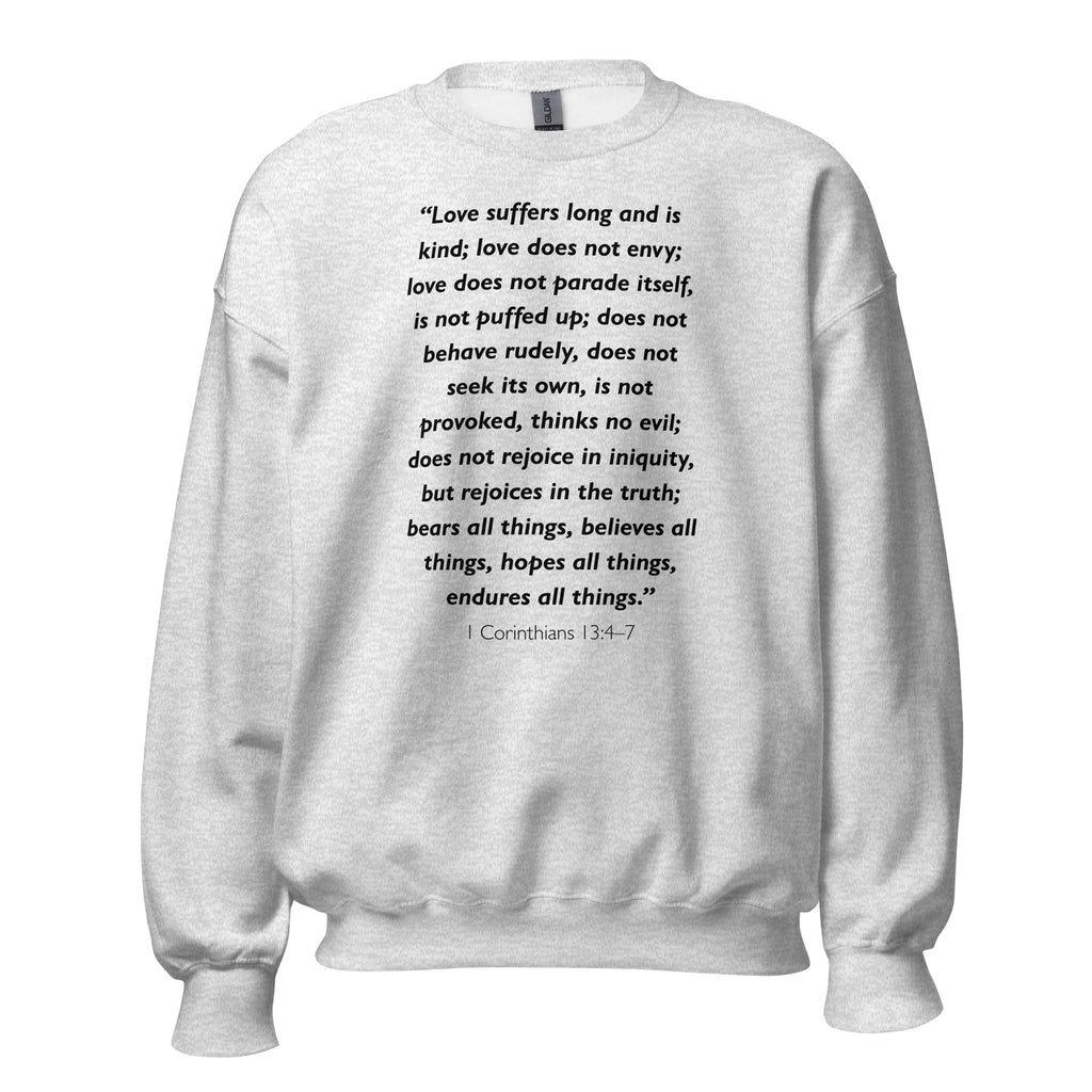 Unisex navy blue sweatshirt with 1 Corinthians 13:4-7 Bible verse printed in black text on front