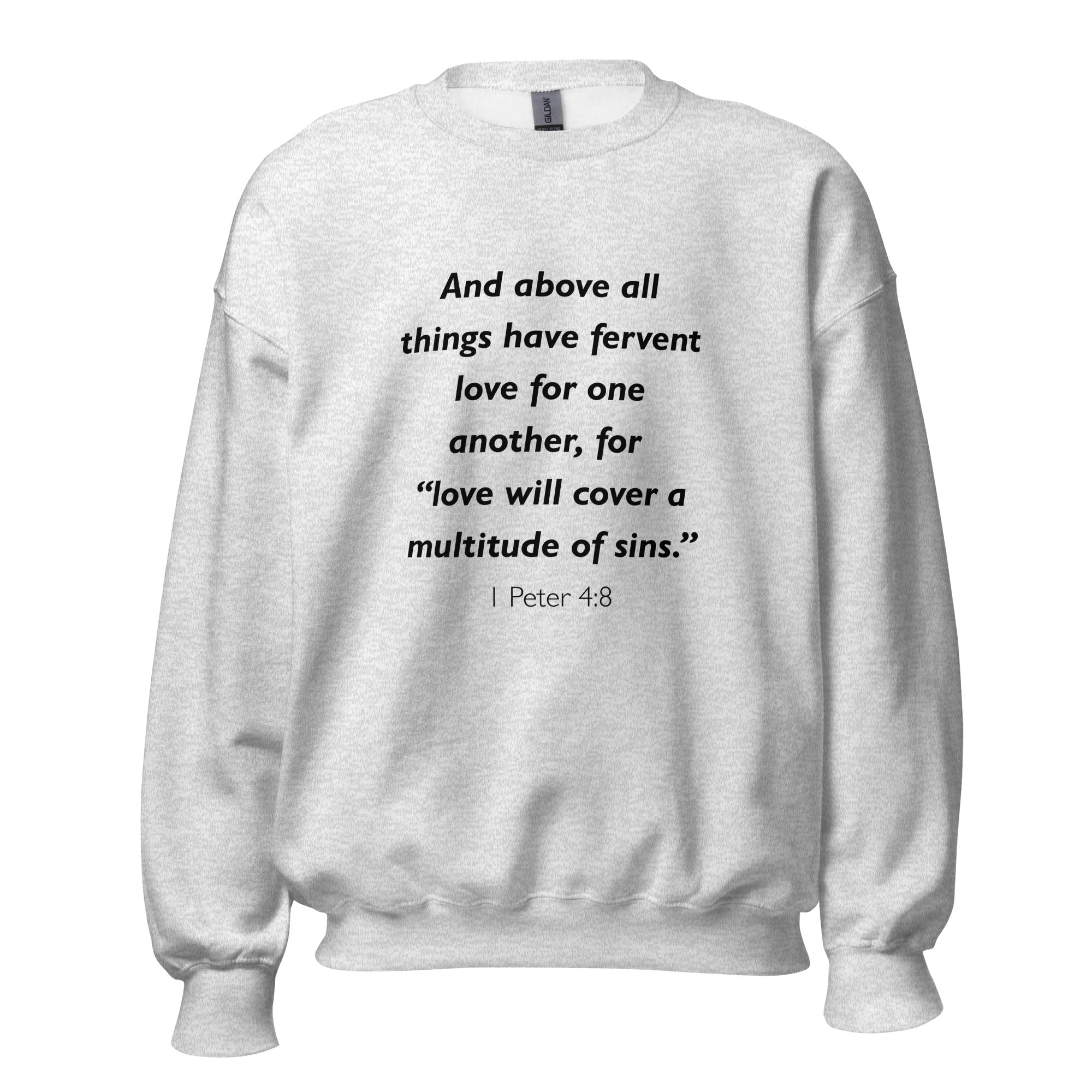 Unisex navy blue sweatshirt with 1 Peter 4:8 Bible verse printed in black text on front