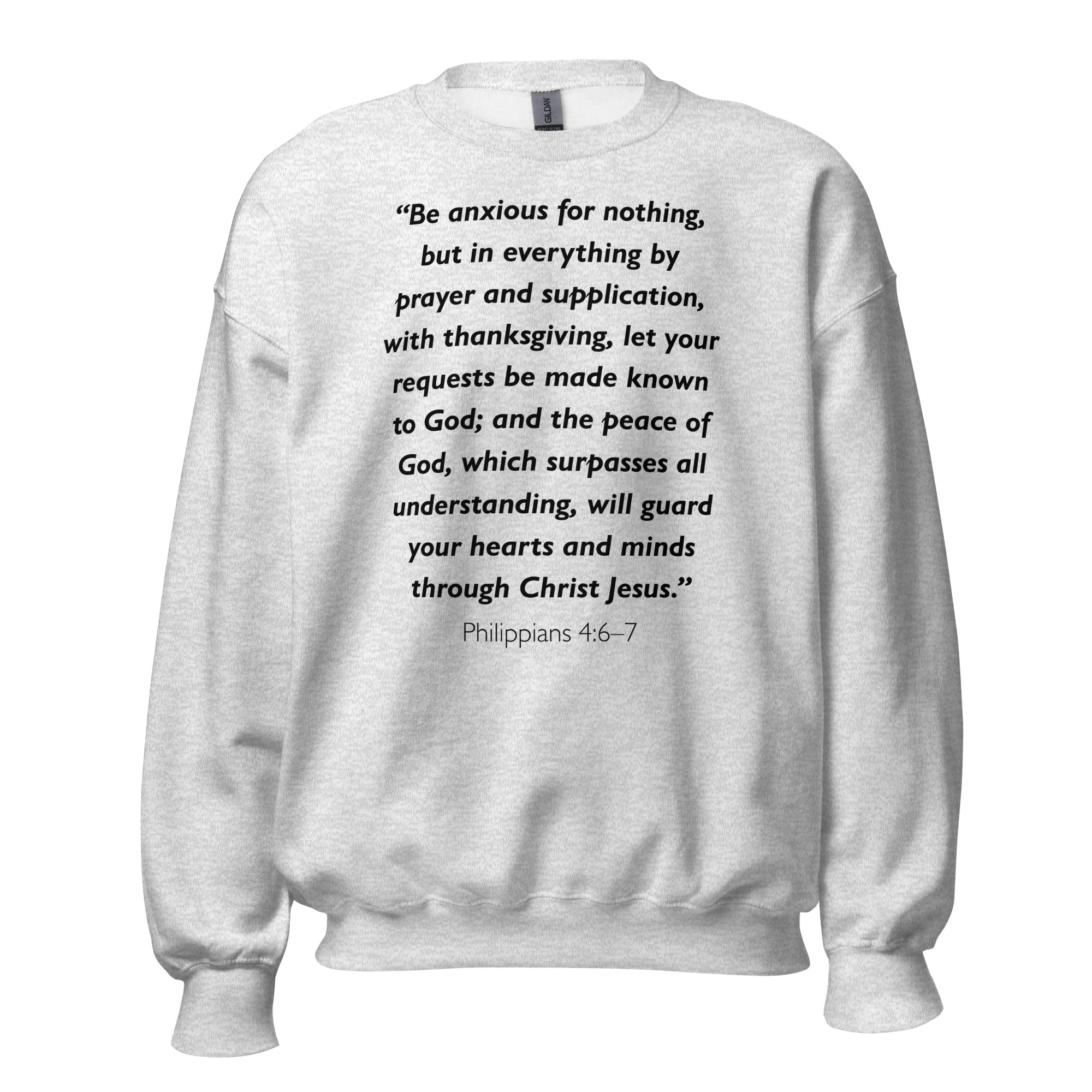 Unisex navy blue sweatshirt with Philippians 4:6-7 Bible verse printed in black text on front