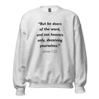 Unisex black sweatshirt with James 1:22 Bible verse printed in black text on front