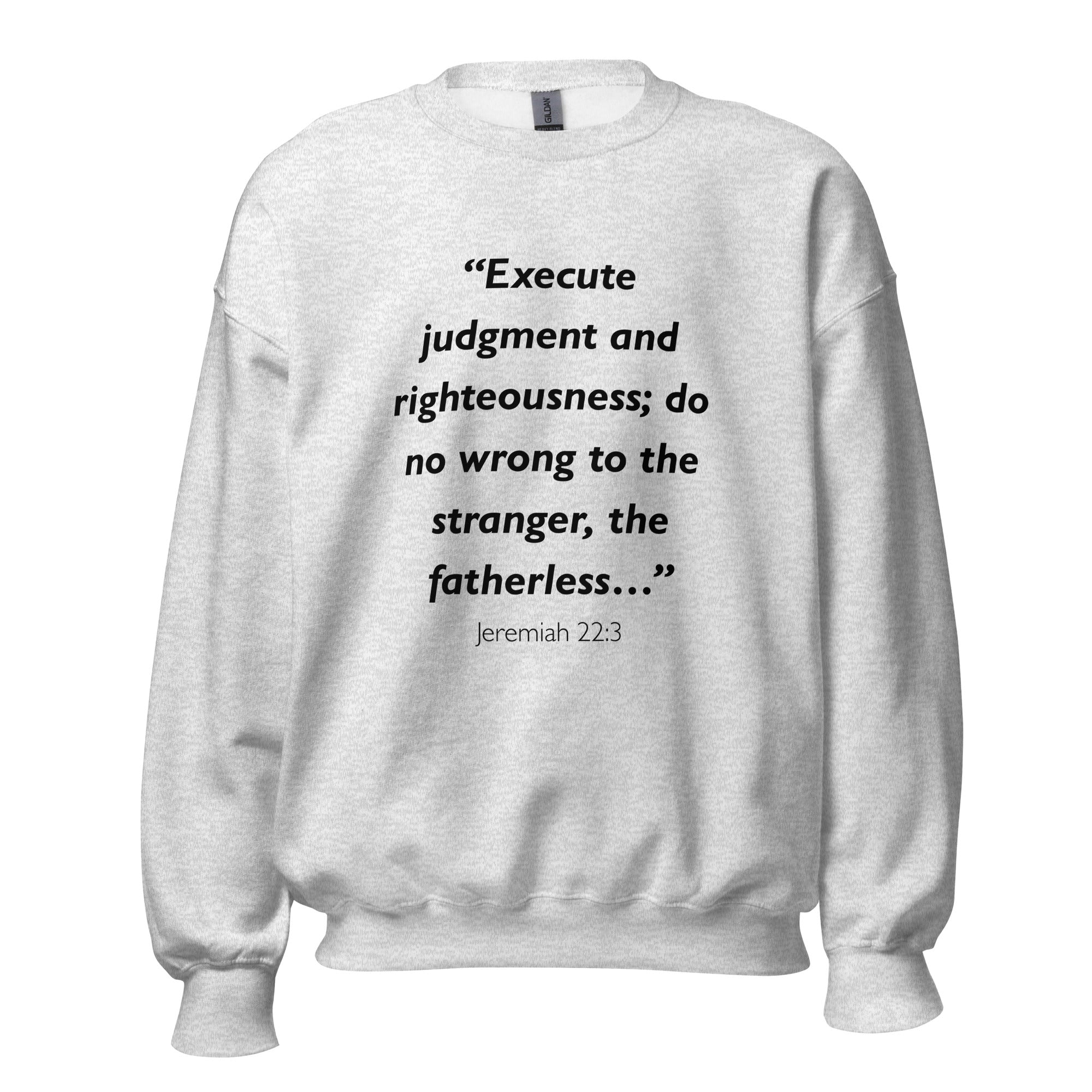 Unisex black sweatshirt with Jeremiah 22:3 Bible verse printed across the chest