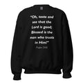 Unisex black sweatshirt with Psalm 34:8 Bible verse printed in white text on front