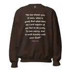 Unisex navy blue sweatshirt with Micah 6:8 Bible verse printed in white text on front