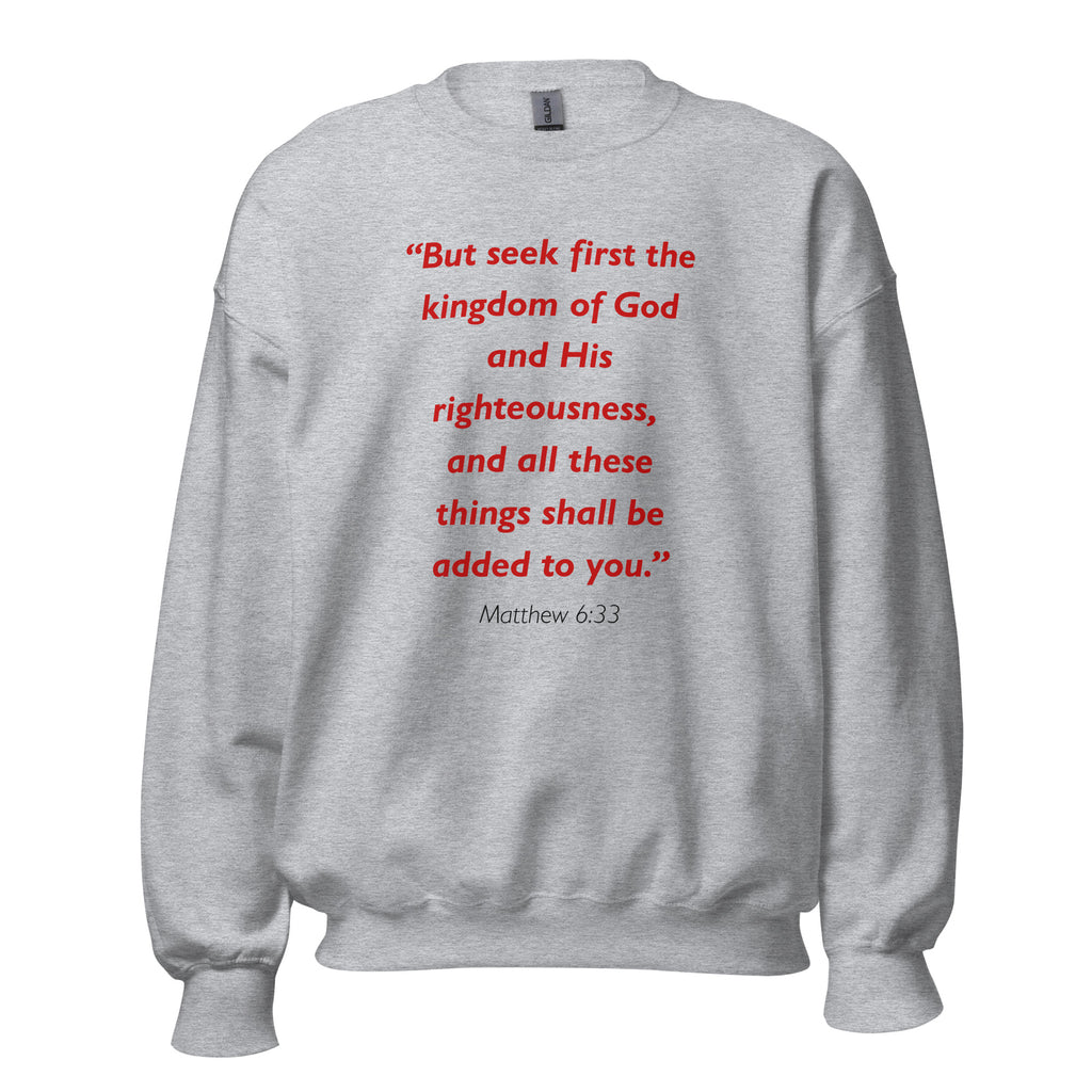 Unisex heather gray sweatshirt with Matthew 6:33 Bible verse printed in red text on front