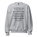 Unisex black sweatshirt with Micah 6:8 Bible verse printed in black text on front