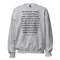 Unisex heather gray sweatshirt with Philippians 4:6-7 Bible verse printed in black text on front