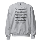 Unisex heather gray sweatshirt with Philippians 4:6-7 Bible verse printed in black text on front