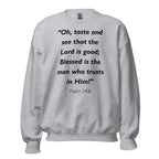 Unisex black sweatshirt with Psalm 34:8 Bible verse printed in black text on front