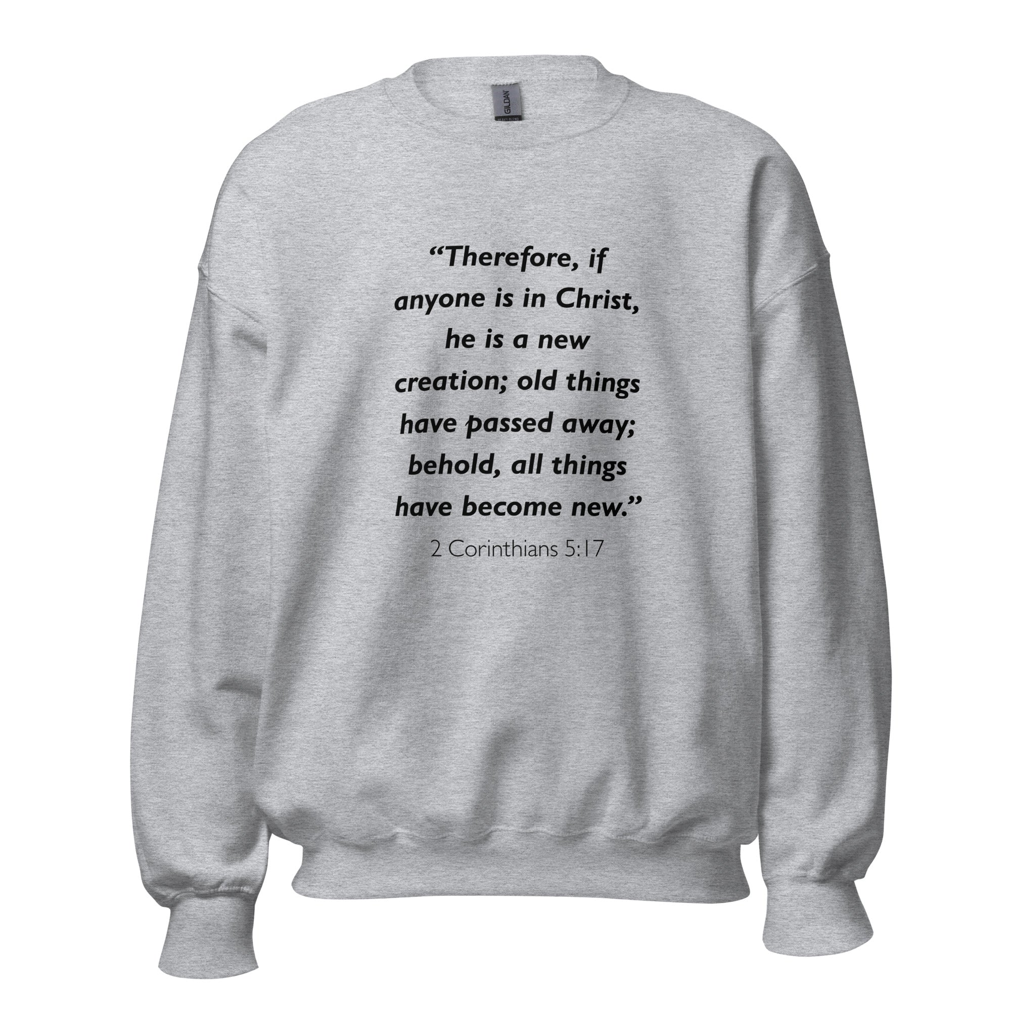 Unisex black sweatshirt with 2 Corinthians 5:17 Bible verse printed in black text on front