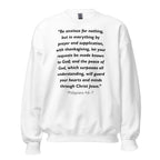 Unisex black sweatshirt with Philippians 4:6-7 Bible verse printed in black text on front