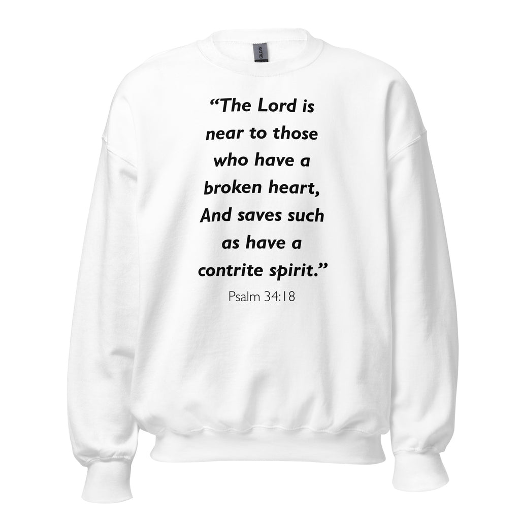 Unisex navy blue sweatshirt with Psalm 34:18 Bible verse printed in black text on front