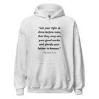 Unisex black hoodie with Matthew 5:16 Bible verse printed in black text on front
