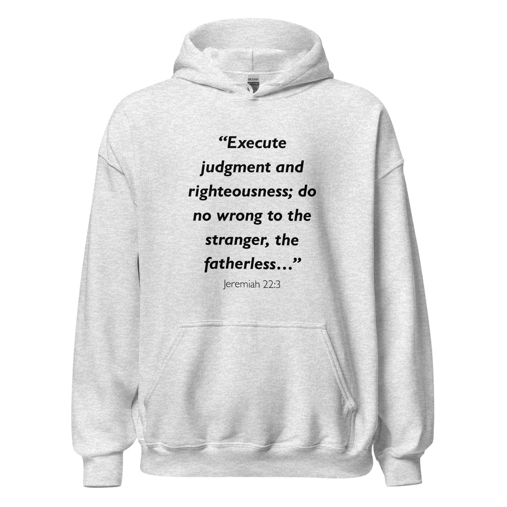 Unisex black hoodie with Jeremiah 22:3 Bible verse printed across the chest