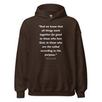 Unisex navy blue hoodie with Romans 8:28 Bible verse printed in white text on front