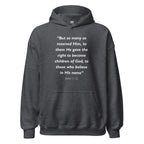 Unisex black hoodie with John 1:12 Bible verse printed in white text on front