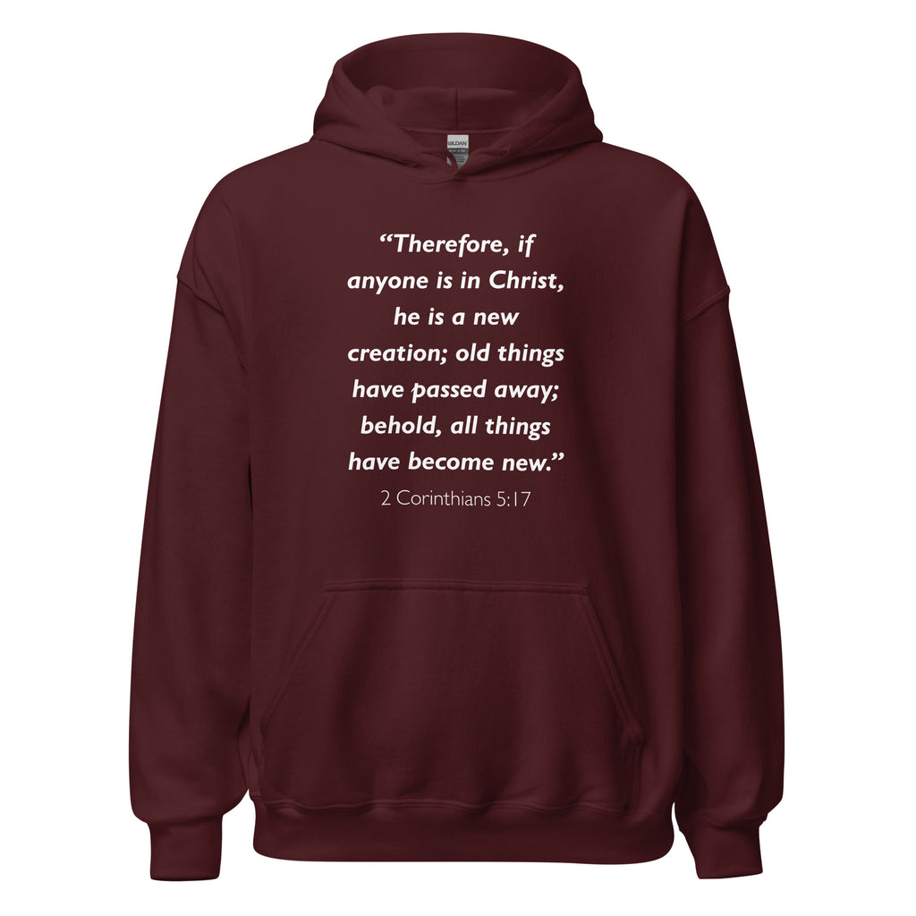 Unisex navy blue hoodie with 2 Corinthians 5:17 Bible verse printed in white text on front