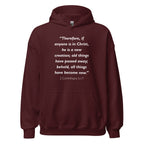 Unisex navy blue hoodie with 2 Corinthians 5:17 Bible verse printed in white text on front