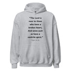 Unisex heather gray hoodie with Psalm 34:18 Bible verse printed in black text on front