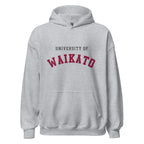 Unisex black hoodie featuring University of Waikato logo printed across the front chest